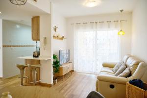 TV a/nebo společenská místnost v ubytování Apartment Albir Playa Paradise