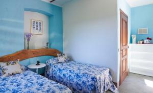 A bed or beds in a room at Cascina Sant'Eufemia