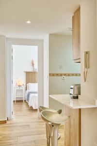 Postel nebo postele na pokoji v ubytování Apartment Albir Playa Paradise