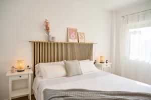 Postel nebo postele na pokoji v ubytování Apartment Albir Playa Paradise