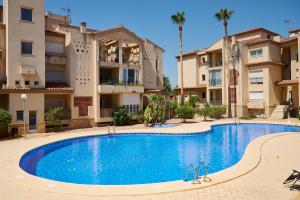 Bazén v ubytování Apartment Albir Playa Paradise nebo v jeho okolí