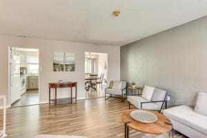 a living room with a couch and a table at 5 Mi to Downtown Harrisburg - Family Home! in Harrisburg