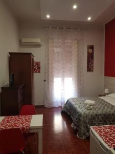 Postel nebo postele na pokoji v ubytování B&B Iside