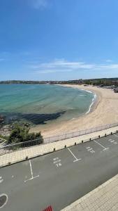 an empty parking lot next to a beach at Studio Kikki Sozopol in Sozopol