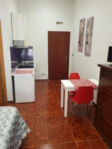 Kuchyň nebo kuchyňský kout v ubytování B&B Iside