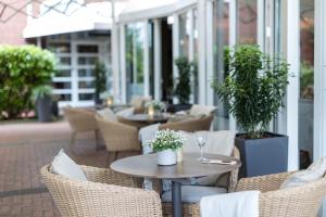 Ein Sitzbereich in der Unterkunft Hotel Am Badepark