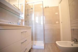 a bathroom with a shower and a sink at B&B Da Emma in Trentinara +12 photos