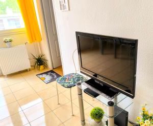 A television and/or entertainment centre at Atlantis apartman