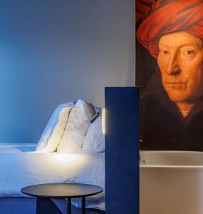 Postel nebo postele na pokoji v ubytování Hotel Montanus