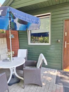 Patio nebo venkovní prostory v ubytování domek letniskowy 3 os Pod Bukiem