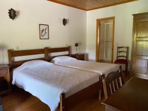 Ένα ή περισσότερα κρεβάτια σε δωμάτιο στο Quinta das Uchas