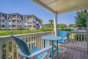 A balcony or terrace at Ocean Forest Villas Cozy Oceanview Unit D116