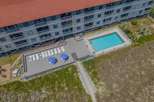 Πισίνα στο ή κοντά στο Chateau By the Sea Oceanfront Unit H2