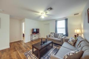a living room with a couch and a table at LaBelle Apartment, Close to Parks! in La Belle