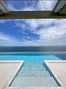 Fotografie z fotogalerie ubytování 芭提雅顶级海景公寓Copacabana大户型35sqm高层景观无边泳池如画 v destinaci Jomtien pláž + 21 fotografií