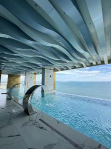Fotografie z fotogalerie ubytování 芭提雅顶级海景公寓Copacabana大户型35sqm高层景观无边泳池如画 v destinaci Jomtien pláž