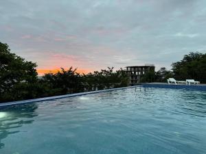 Bazén v ubytování Hotel Biota nebo v jeho okolí