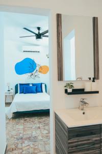 Voodi või voodid majutusasutuse Casa de Playa Hatillo toas
