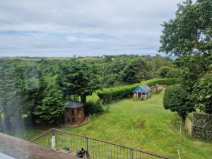an aerial view of a farm with tents and trees at Woodvale Bungalow in Little Haven +23 photos