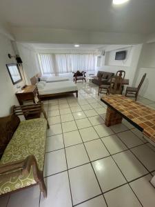 TV a/nebo společenská místnost v ubytování Hotel Oasis Cuyutlan