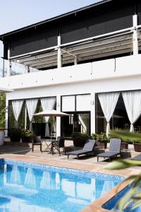 Bazén v ubytování Hotel Tres Soles nebo v jeho okolí