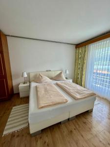 Cama o camas de una habitación en Strandhotel Prinz