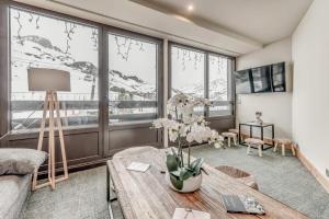 Televízia a/alebo spoločenská miestnosť v ubytovaní Résidence Palafour - Appartements «Palafour Lodges» MAE-0174