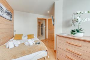 Posteľ alebo postele v izbe v ubytovaní Résidence Palafour - Appartements «Palafour Lodges» MAE-0174