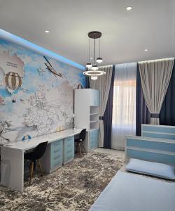 PENTHOUSE - HORIZON of KHUJAND客房内的一张或多张床位