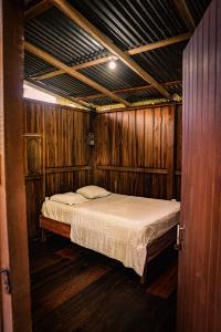 Letto o letti in una camera di Flutterby House Hostel