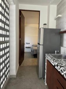 Ένα ή περισσότερα κρεβάτια σε δωμάτιο στο MID-498 Centro +64 φωτογραφίες