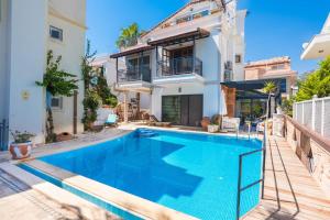 Πισίνα στο ή κοντά στο Kalkan Merkezde Havuzlu Apart +15 φωτογραφίες