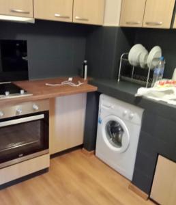 Η κουζίνα ή μικρή κουζίνα στο Venus Apartment