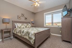a bedroom with a bed and a window at License to Chill in Swanton +43 photos