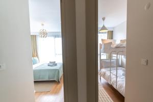 Postel nebo postele na pokoji v ubytování Modern Stylish 2br Apt, Near Eyp Sultan Mosque
