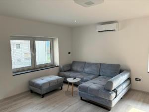 Un lugar para sentarse en Livan Apartment