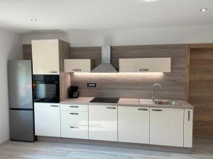 Una cocina o cocineta en Livan Apartment