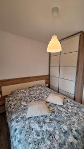 Giường trong phòng chung tại Lux D2 Divčibare