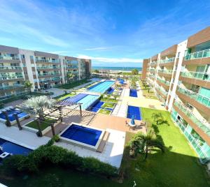 an overhead view of a swimming pool in a resort at VG FUN Praia do Futuro Pé na Areia ap 311 IMOB TEMPORADA in Fortaleza