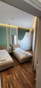 Postel nebo postele na pokoji v ubytování Hotel Miami Beach