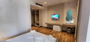 TV a/nebo společenská místnost v ubytování Hotel Miami Beach