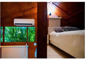 Postel nebo postele na pokoji v ubytování HW Tiny Home