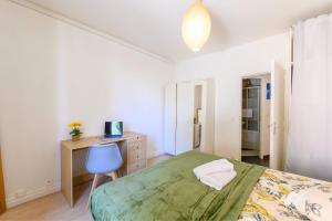 Katil atau katil-katil dalam bilik di Le Chevreul appartement entier proche Paris