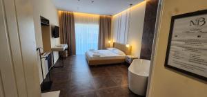 Postel nebo postele na pokoji v ubytování Hotel Miami Beach