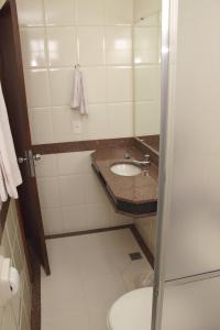 Um banheiro em Hotel São Bento