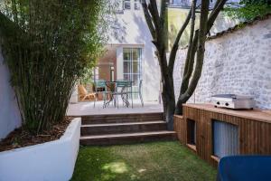 Κήπος έξω από το Villa Spa Arborée Hyper Centre