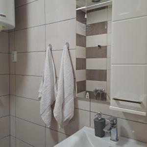 Koupelna v ubytování Apartman Burinović + 9 fotografií