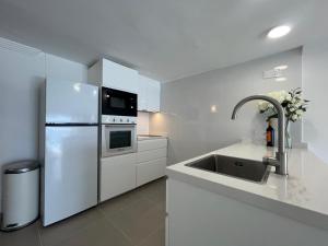 Kuchyň nebo kuchyňský kout v ubytování Apartamento Callao Salvaje en el mar con wifi