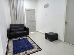 Posezení v ubytování Homestay Warisan Iman