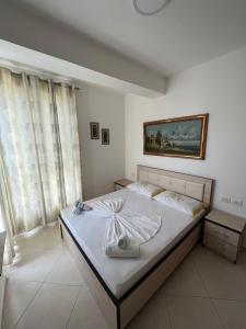 Postel nebo postele na pokoji v ubytování Al Mare Apartments